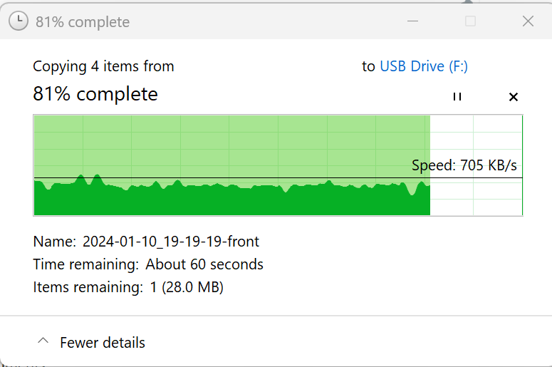 Screenshot of transfering files from PC to USB drive at 705KB/s speed